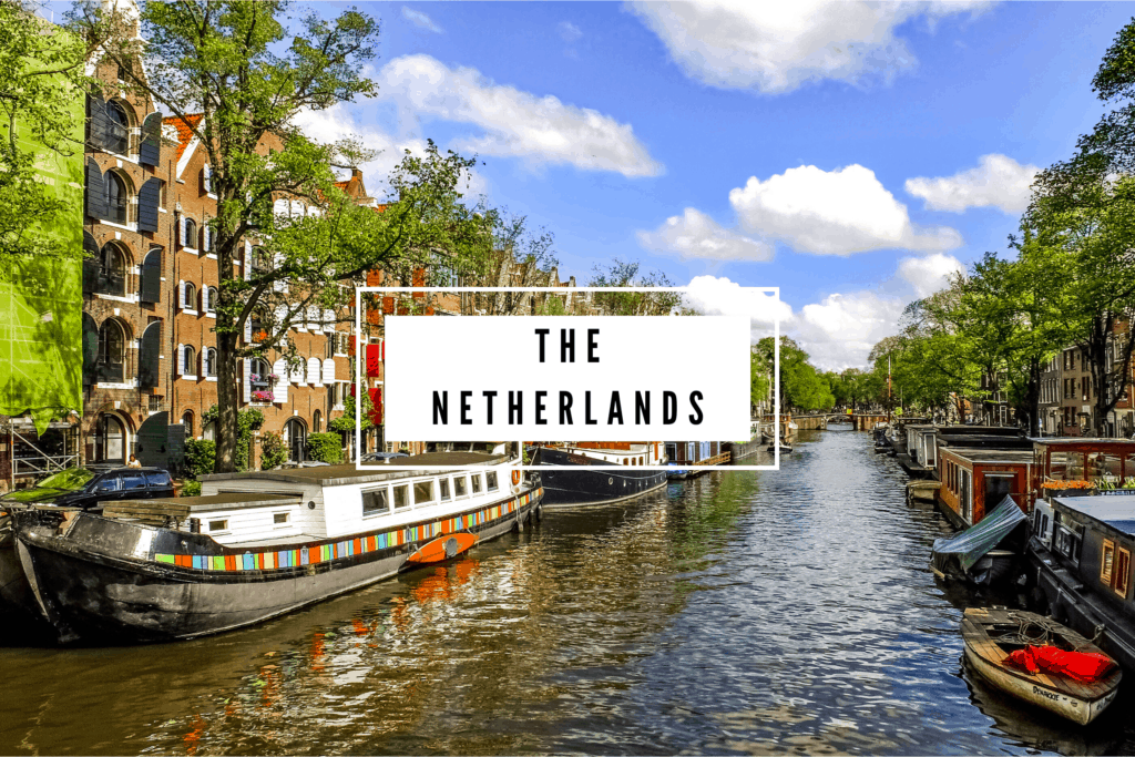 Canals of Amsterdam with the words "The Netherlands" in a white box