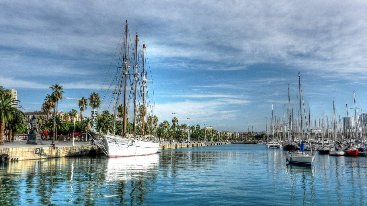Large sailboat docked in the Barcelona harbor