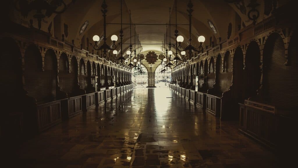Interior of Ypres' Cloth Hall" in the dark