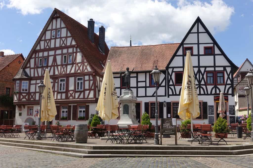 Traditional German buildings above an outdoor cafe