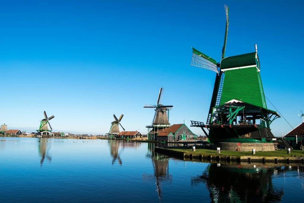 Large green windmills in Zaanse Schans, Netherlands