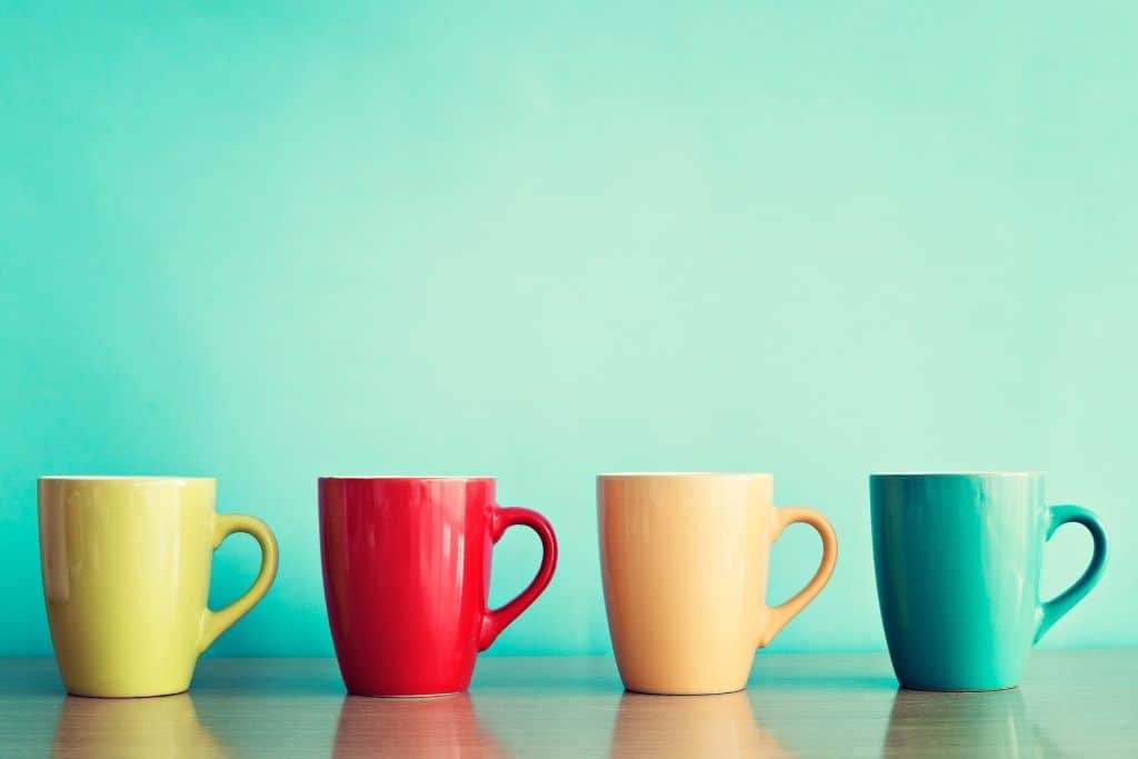 Standard colorful coffee mugs on a table