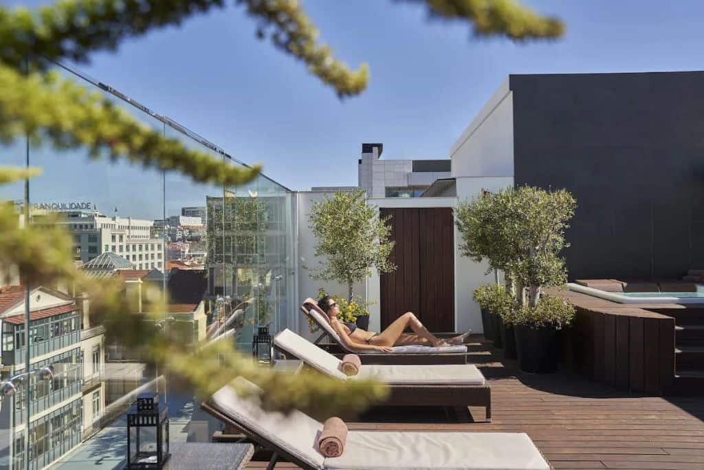 Woman sunbathing at the PortoBay Liberdade Hotel in Lisbon