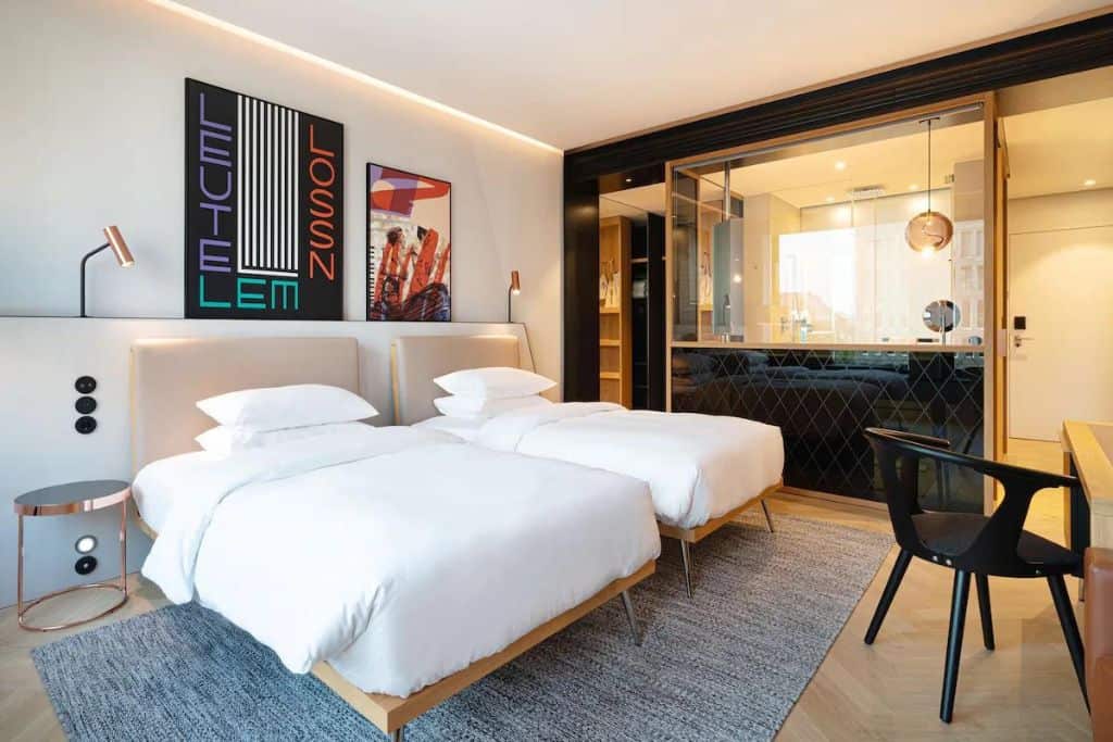 Artsy hotel room with 2 beds