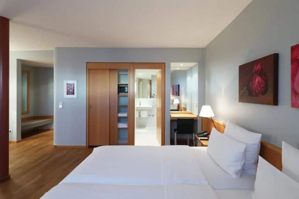 Modern hotel room with a private bathroom