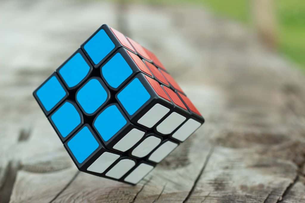 The blue, red, and white sides of a Rubik's cube