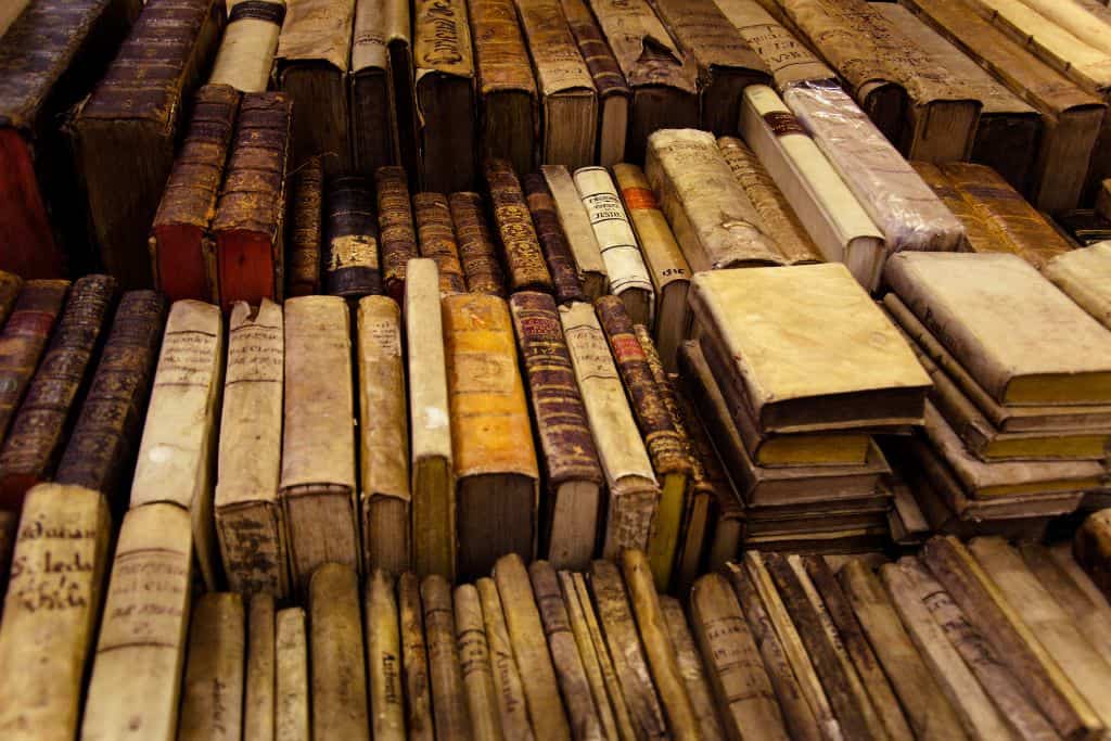Rows of old books in an antique store