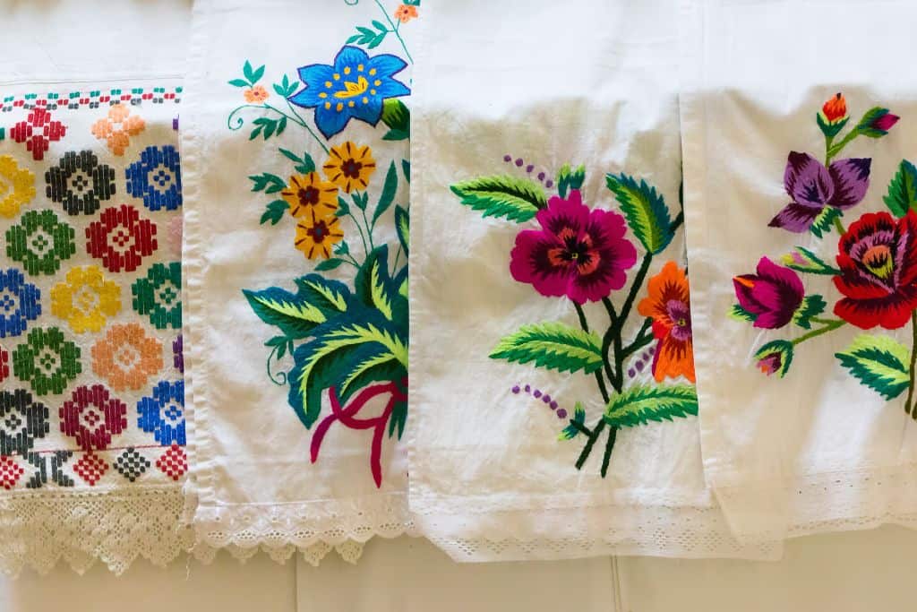 Embroidered towels with flowery patterns
