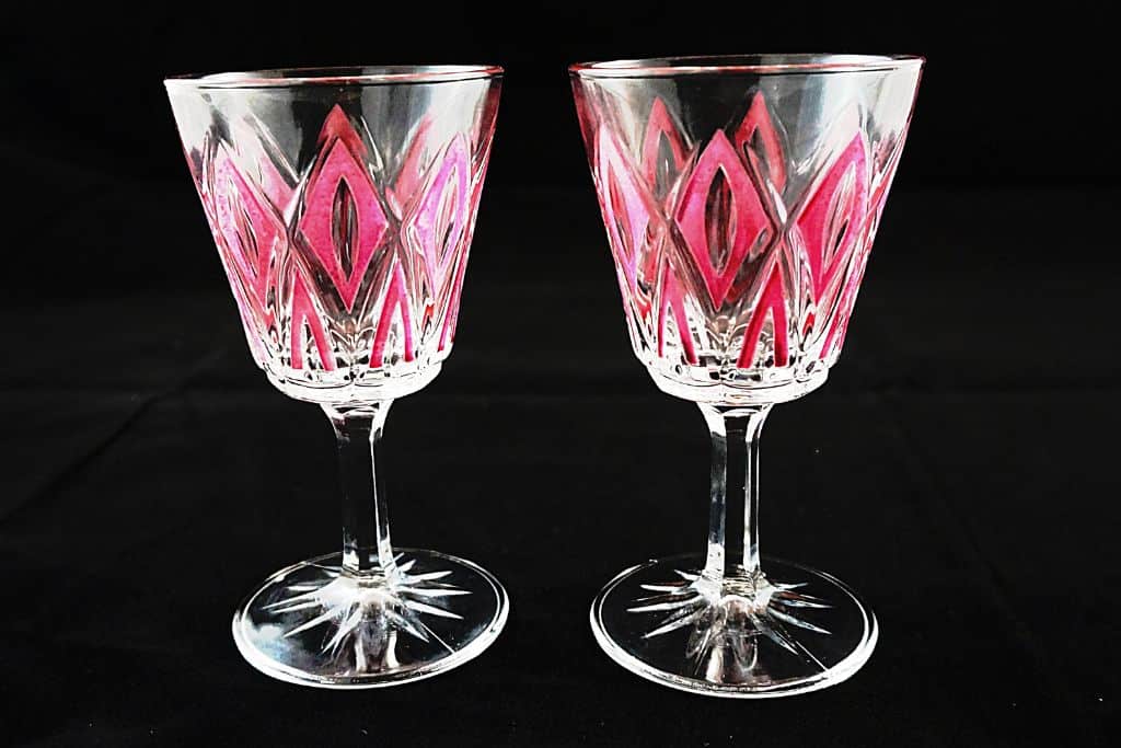 Two clear and pink glasses made of Ajka crystal