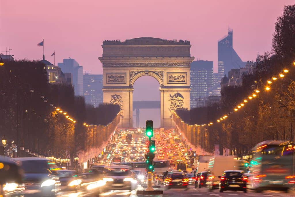 Very busy and crowded Champs Elysees around sunset