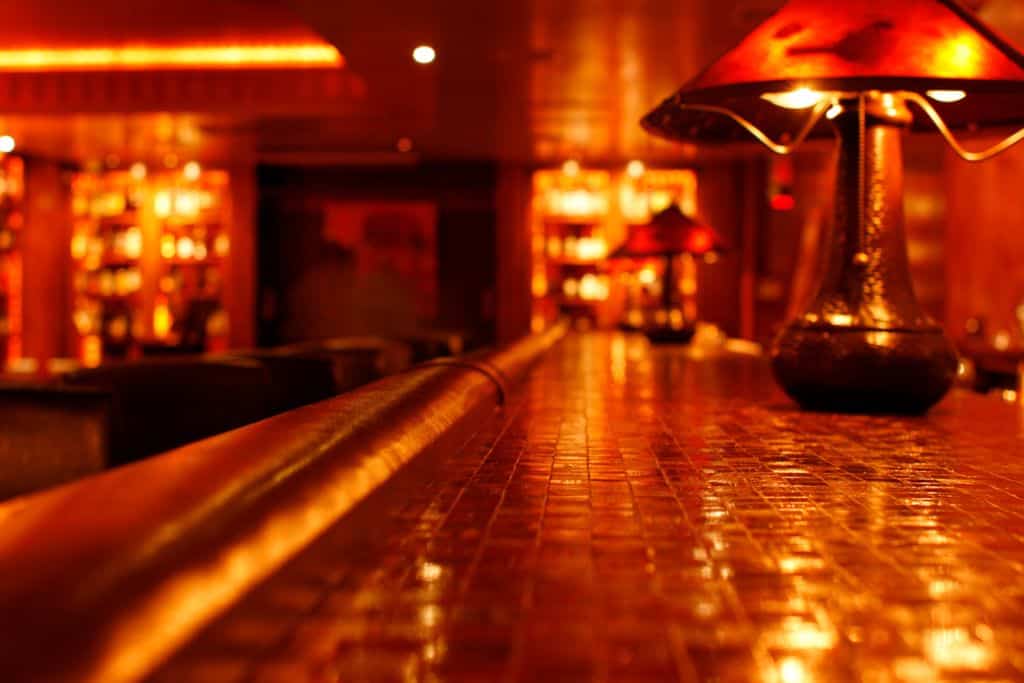 Red lighting in an empty bar