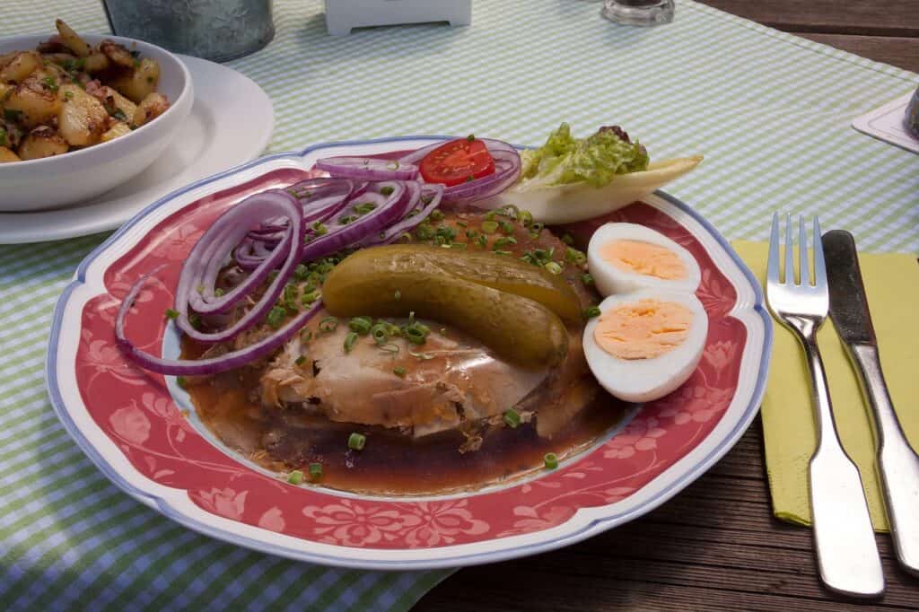 Plate of German food on a checkered table cloth