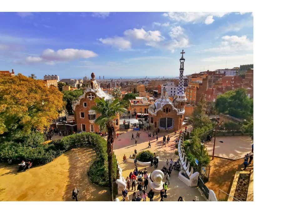 Park Guell filled with people late in the day