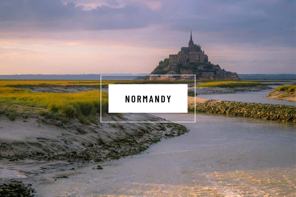 Mont Saint-Michel with the word "Normandy" in a white box