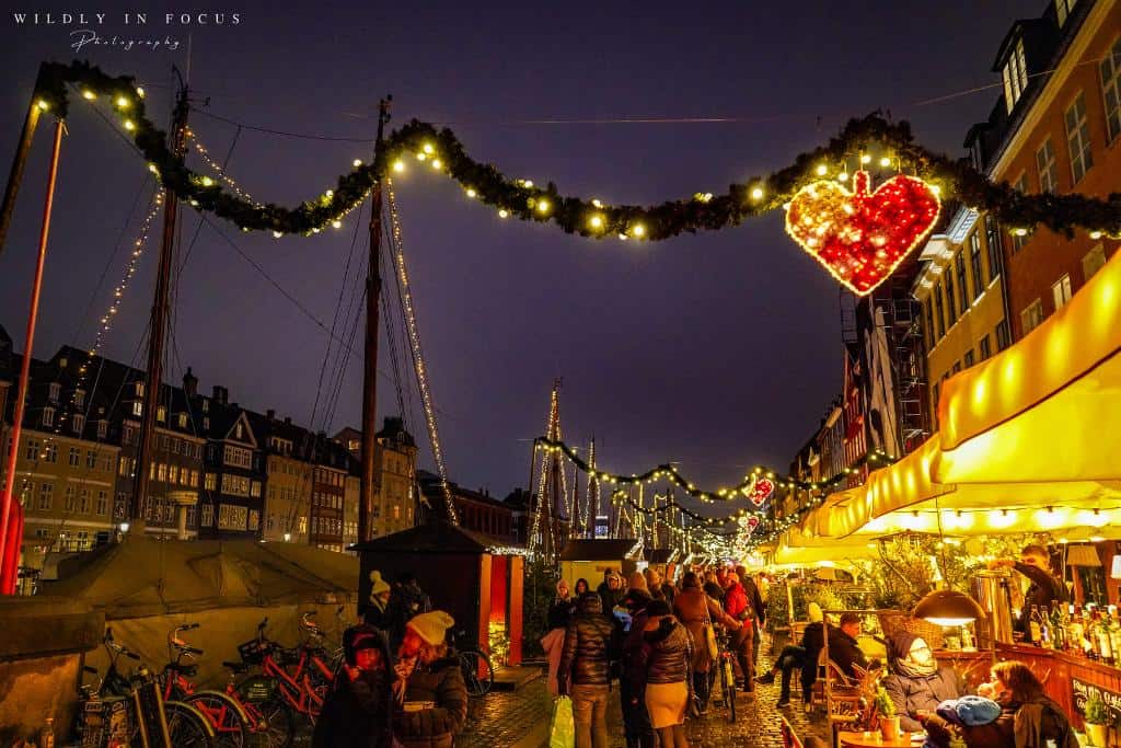 Nyhavn's holiday-decorated streetside in Copenhagen