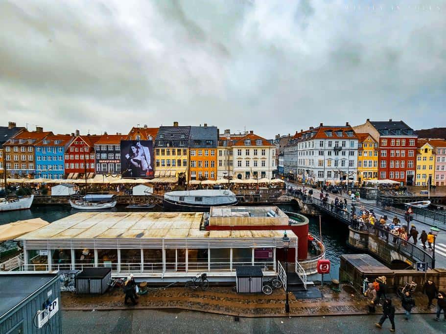 Elevated view of Copenhagen's Nyhavn Harbor on a rainy day