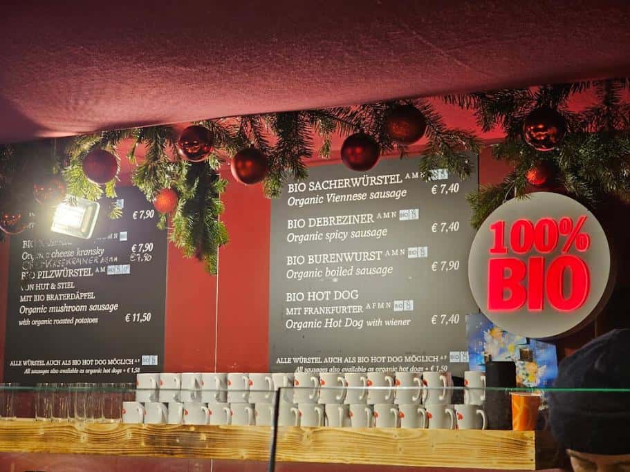 Large black and white menu with Viennese food and beverages listed