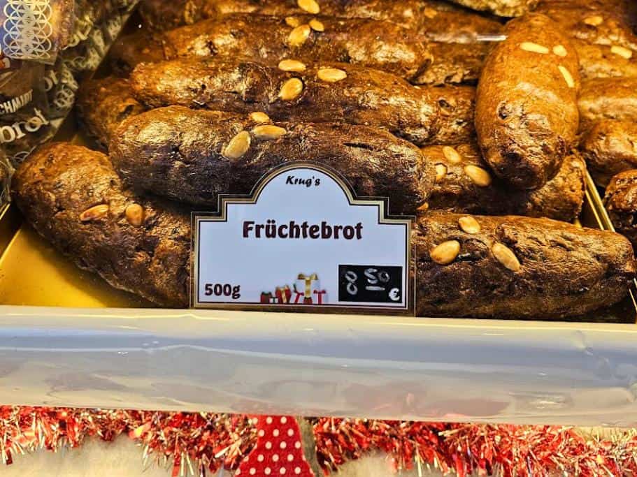 German fruit bread on display in a bakery case