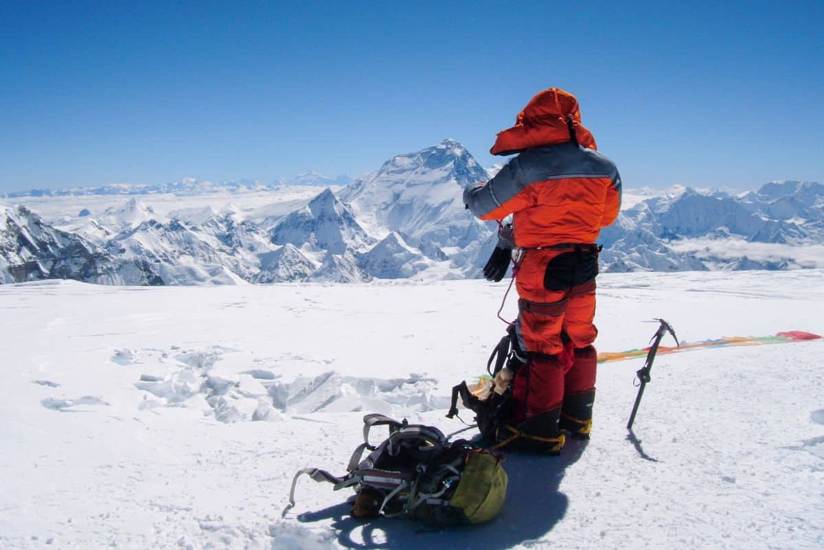 Person in a red winter suit in the arctic