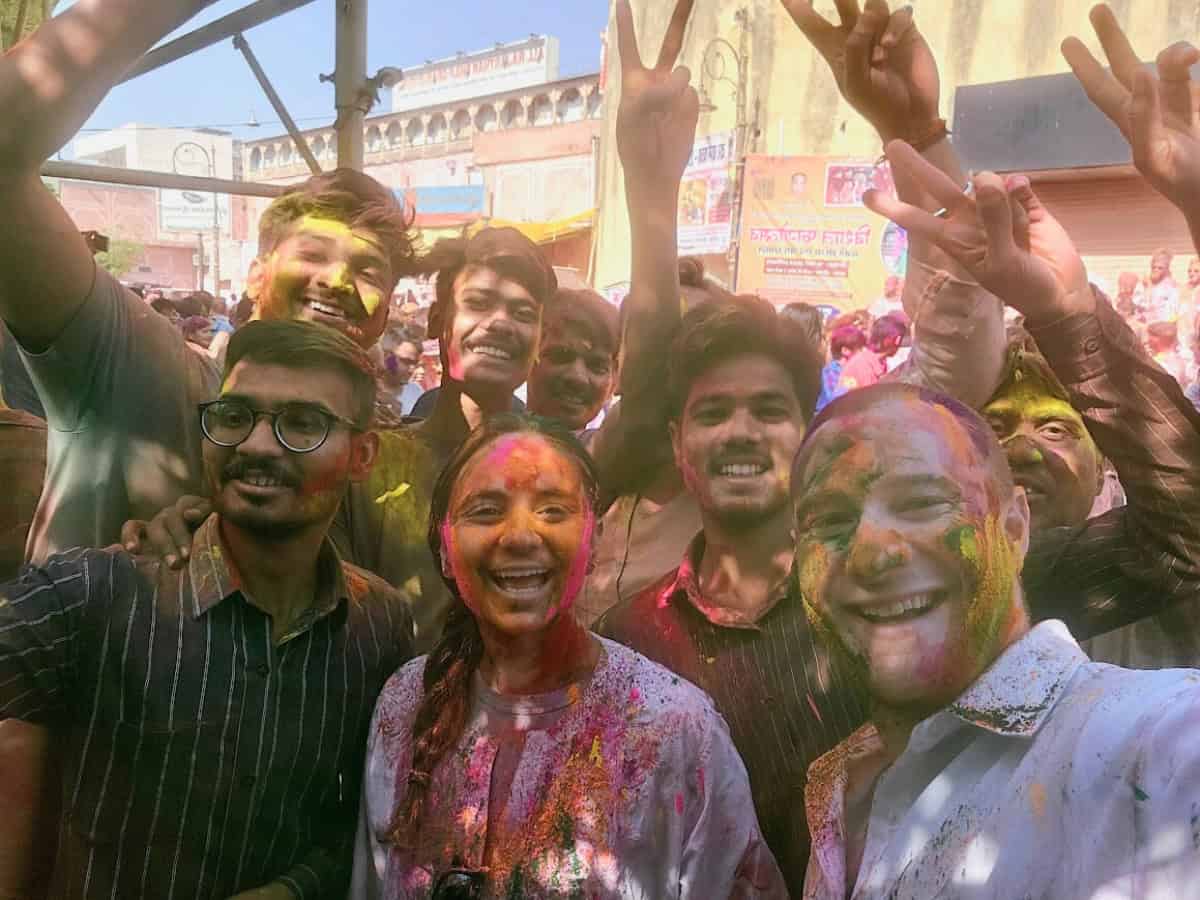 Group of people celebrating Holi in Jaipur, India
